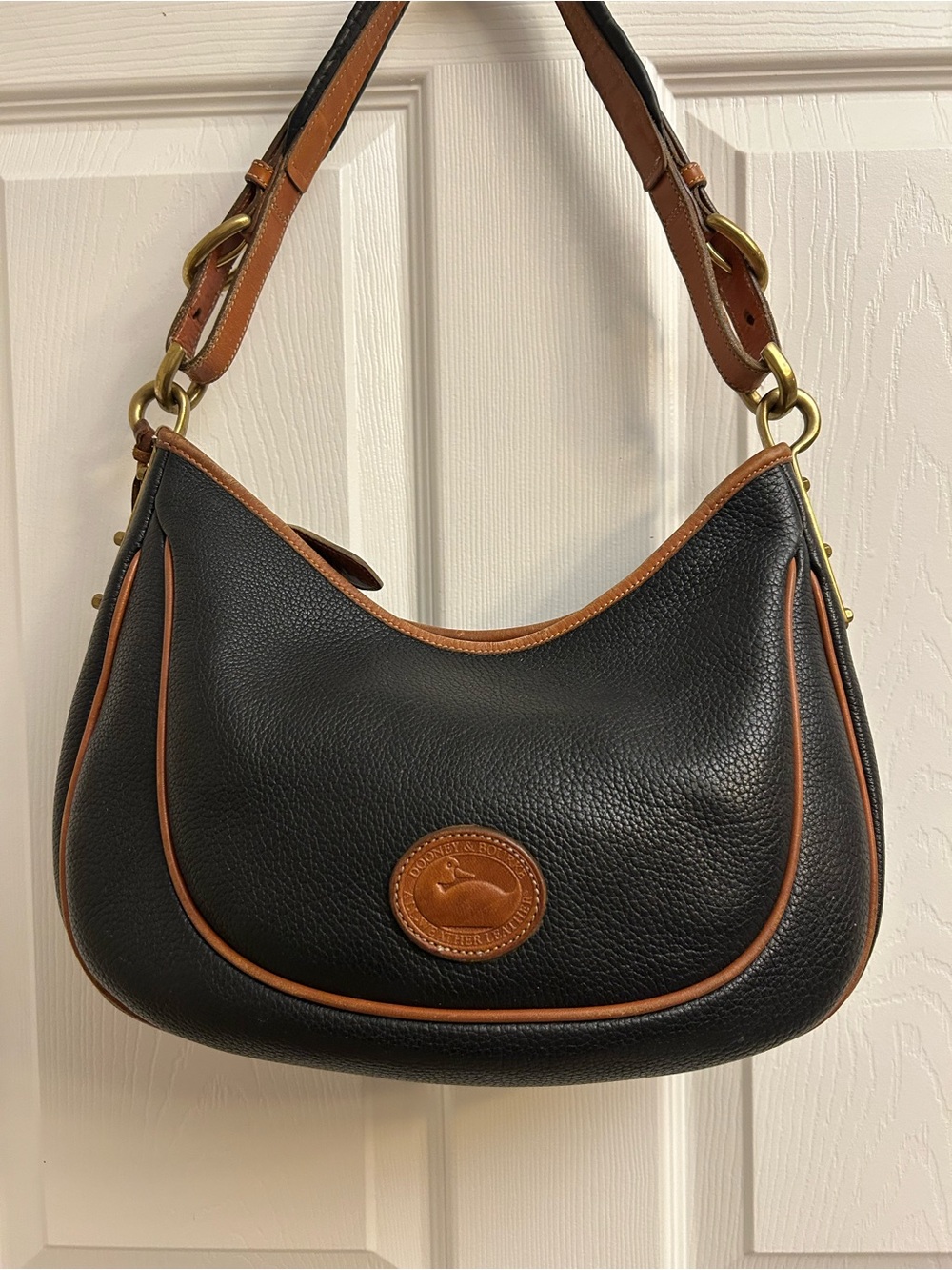 Dooney & Bourke Vintage Black Leather Hobo with Brown Trim and Strap